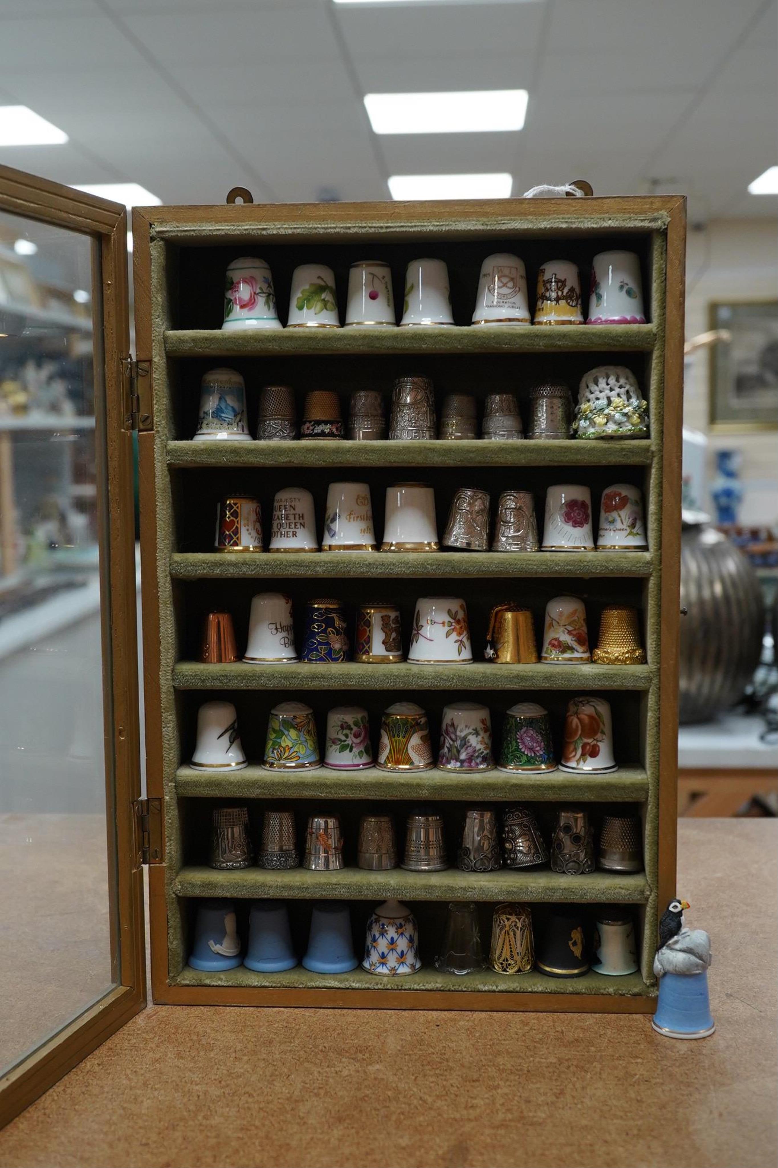 A collection of decorative thimbles, some silver. Condition - good